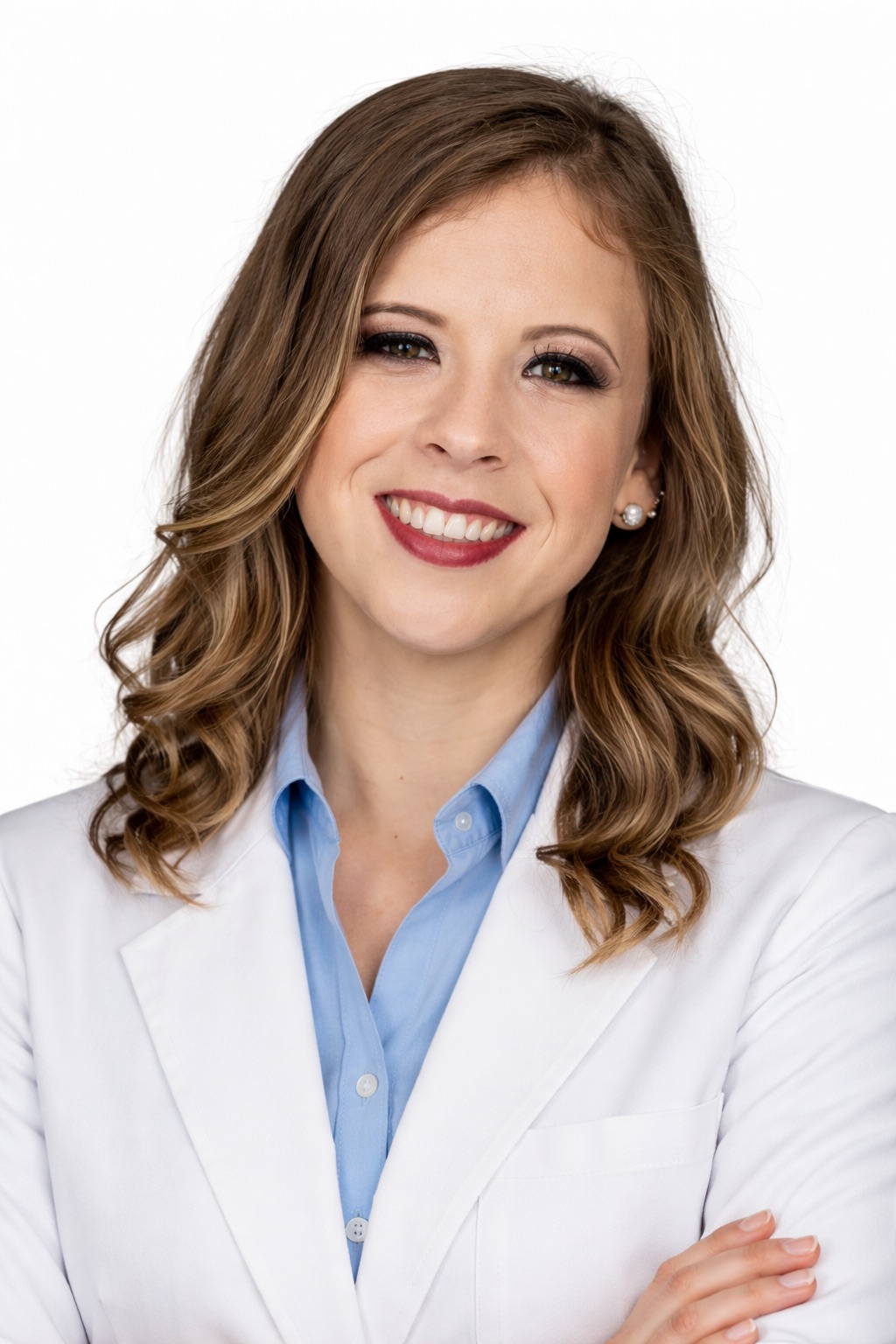 Dra. Priscila Cintra Campos Resende, de jaleco, sorrindo